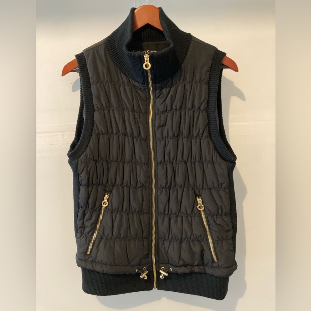 NWOT. Calvin Klein Black Performance ultra stretch vest with gold logo hardware